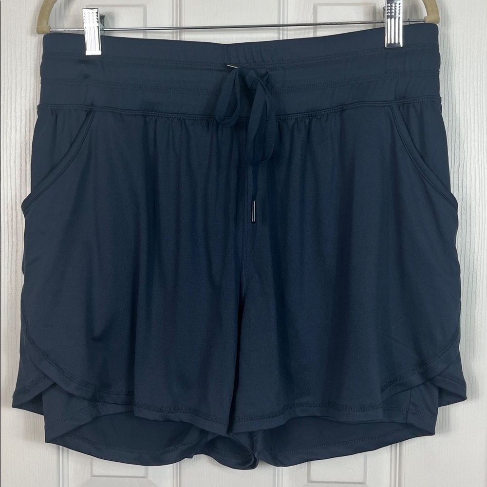 Livi navy blue athletic shorts with rash shirt under. Size 14/16. Pockets - Picture 2 of 7